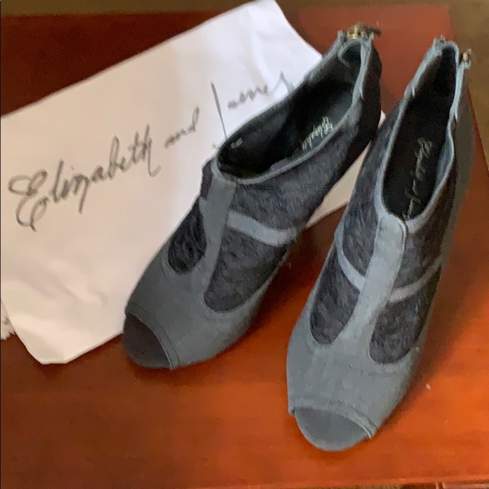 Grey lace bootie with peep toe and skinny heel $90